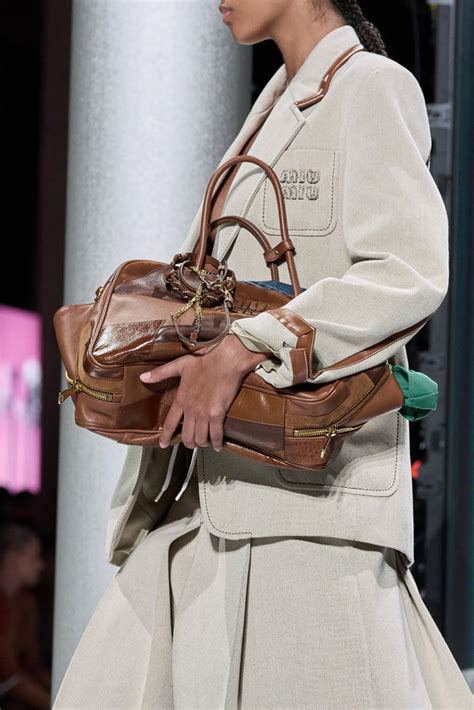 miu miu bag 2024|Miu Miu Shows Overstuffed Bowlers, Bucket Bags and More for Spring 2024 .